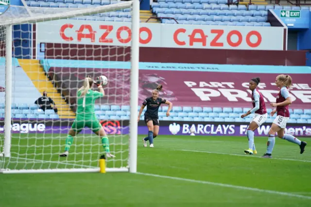 Georgia Stanway has a shot saved