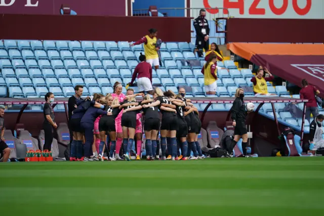 Manchester City in a huddle