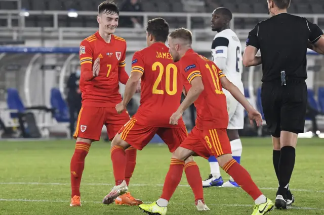 Wales celebrate Kieffer Moore's goal