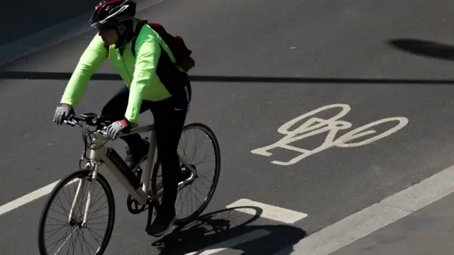 A person rides an electric bike