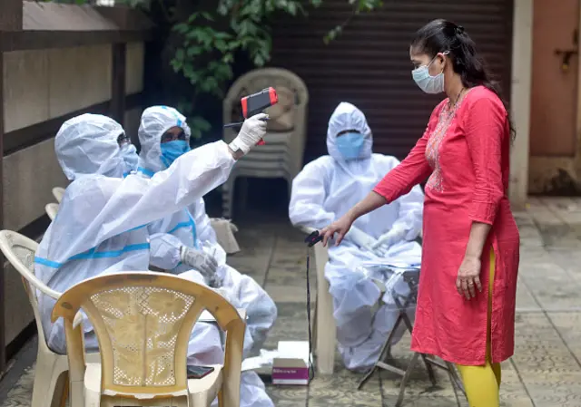 Healthcare workers during COVID-19 screening and swab test at Vileparle(E), on September 6, 2020 in Mumbai, India