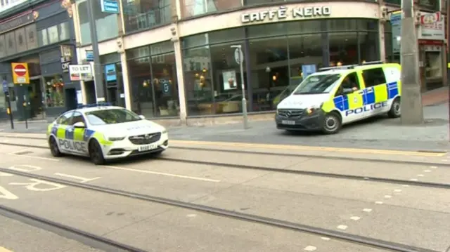 Police vehicles in city centre