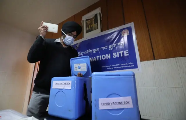 A health worker is seen inside a room during a dry run of Covid-19 vaccination at a centre in Delek Hospital, Dharamsala, India, on 8 January 2021