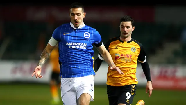 Brighton's Lewis Dunk and Newport's Padraig Amond