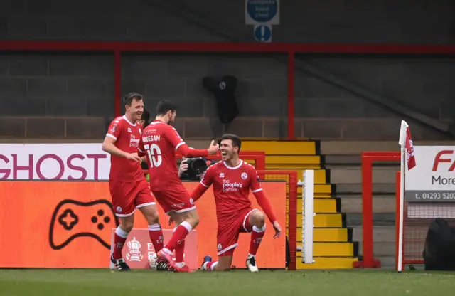 Crawley celebrate their third goal against Leeds