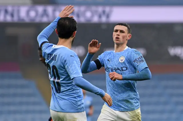 Phil Foden celebrates scoring Man City's third goal against Birmingham City in the FA Cup