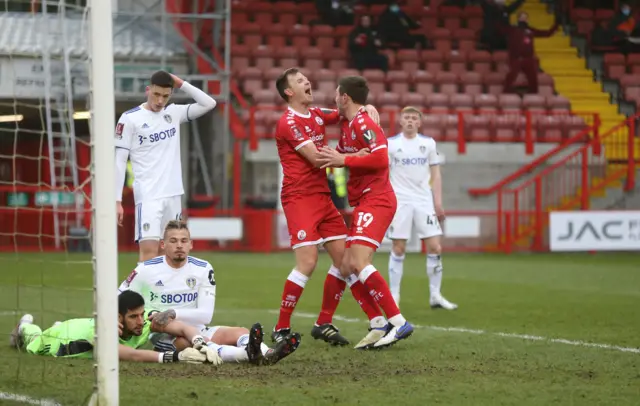 Crawley Town's Jordan Tunnicliffe celebrates scoring his side's third goal with Tony Craig during the FA Cup Third Round match between Crawley Town and Leeds United at The People's Pension Stadium