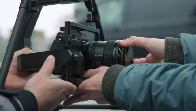 A Sony camera being attached to an Airpeak