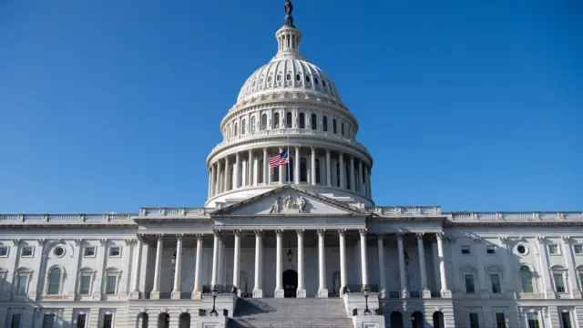 The outside of the US Capitol is seen with a US flag at half-staff in Washington, DC, January 12, 2021, ahead of a House vote calling on US Vice President Mike Pence to invoke the 25th Amendment to remove US President Donald Trump from office.