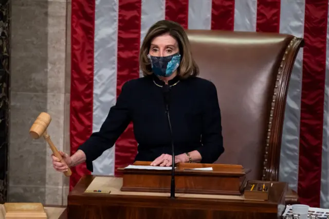 Nancy Pelosi gavels into recess after the House voted to impeach President Donald Trump for inciting an insurrection in the House chamber on Wednesday, January 13, 2021