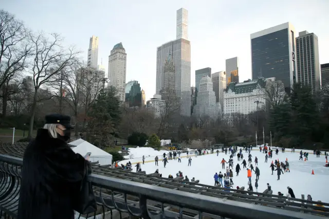 A woman wearing a protective mask looks on near Wollman Rink on December 27, 2020 in New York City.