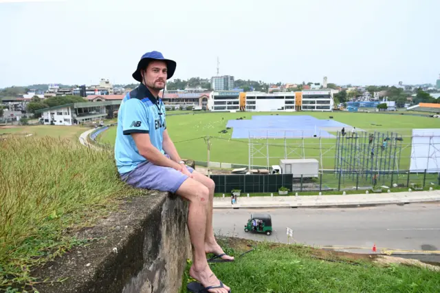 English member of the Barmy Army fan group Rob Lewis, 37, poses for pictures during an interview with AFP at the ramparts of the Galle Fort overlooking Galle International Cricket Stadium, in Galle, some 180 km south of Colombo.