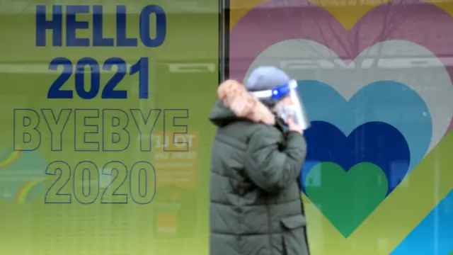 Shopper wearing face shield