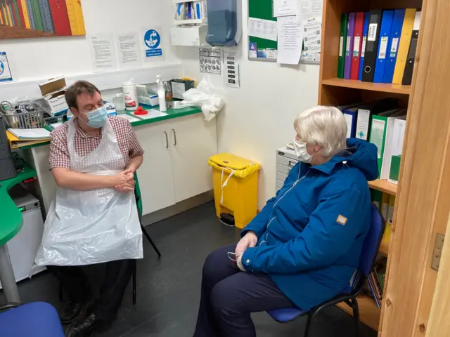 Pharmacist Steffan John gave Rosie Bennett her Covid jab in Llanbedrog, near Pwllheli
