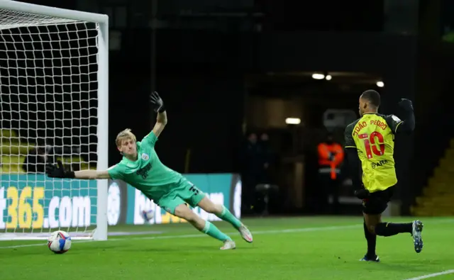 Joao Pedro scores