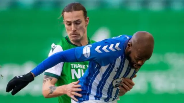 Hibs' Jackson Irvine and Kilmarnock's Youssouf Mulumbu