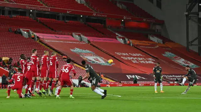 Bruno Fernandes takes a free-kick