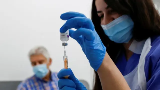 Vaccination being given