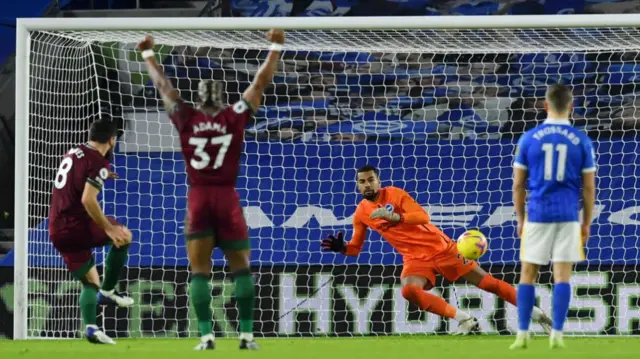 Ruben Neves scores from the penalty spot