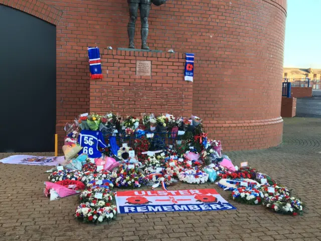 Flowers and wreaths outside Ibrox