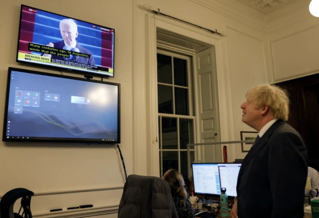 Boris Johnson watches Biden's speech