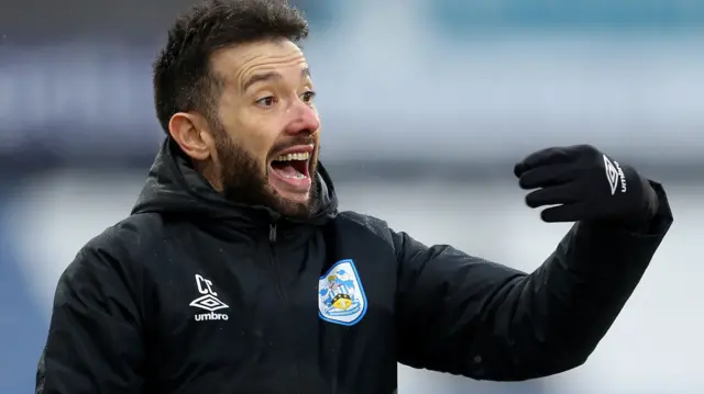 Huddersfield head coach Carlos Corberan on the sidelines