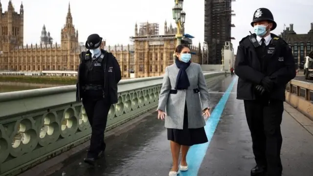 Priti Patel with police officers