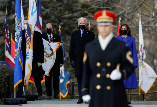 US President Joe Biden and Vice-President Kamala Harris arrive for a wreath-laying ceremony