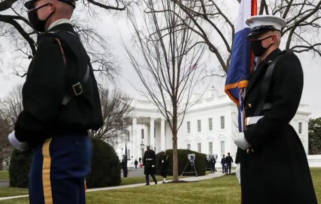 Members of an honour guard await for the arrival of Joe Biden at the White House during his inauguration as the 46th President of the United States, in Washington D.C.,