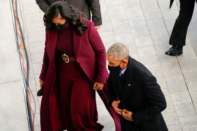 Former US President Barack Obama, and former First lady Michele Obama arrive for the inauguration