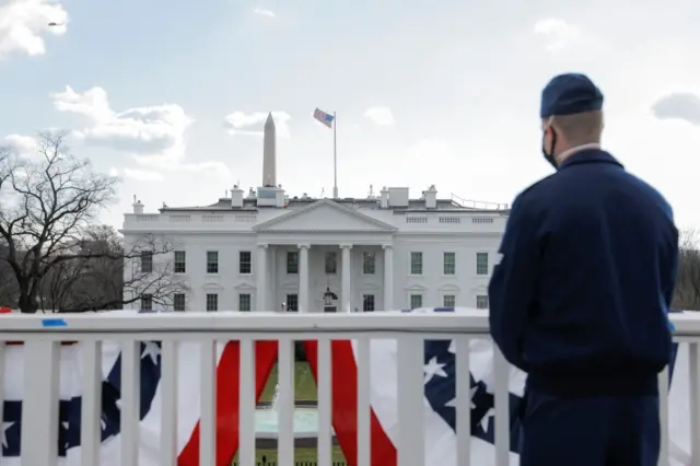 A member of the Air Force looks toward the White House ahead of the arrival of President Joe Biden, in Washington, U.S., January 20, 2021.