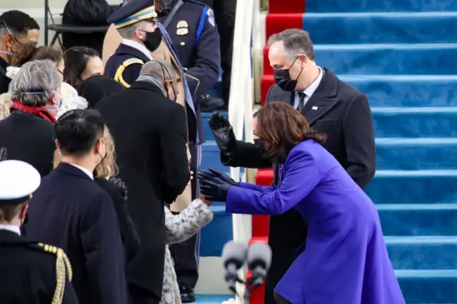 U.S. Vice President-elect Kamala Harris and husband Doug Emhoff arrive to the inauguration