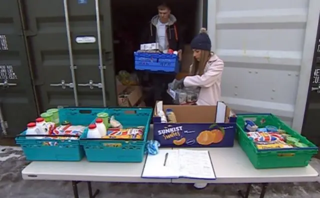 Bex Wilson and her husband deliver food