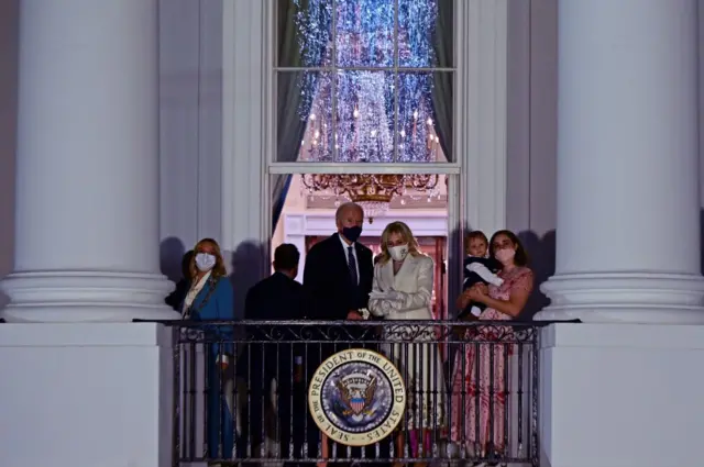 The Bidens view fireworks from White House balcony