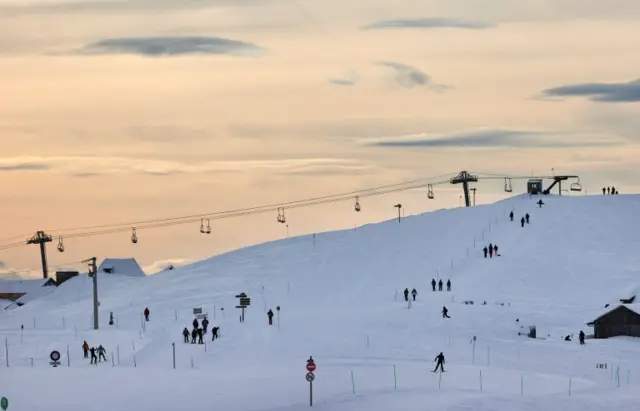 People enjoy a winter day amid coronavirus disease (COVID-19) lockdown measures in the Semnoz ski resort near Annecy, France, January 20, 2021