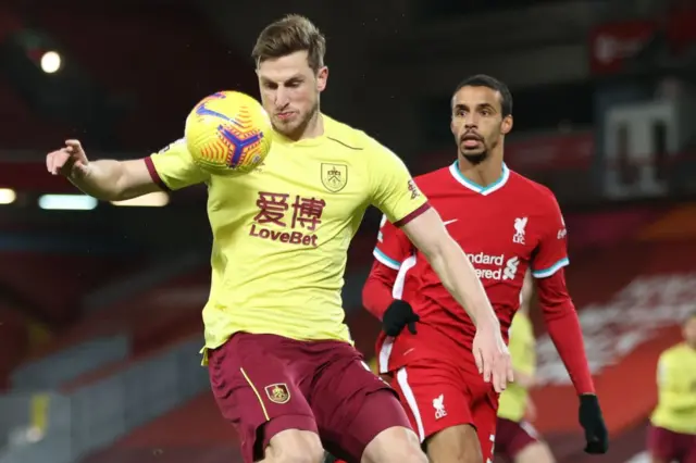 Burnley's Chris Wood and Liverpool's Joel Matip