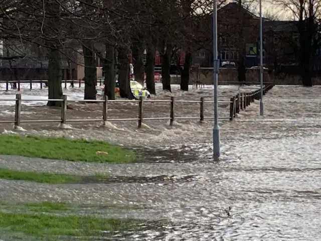 Police patrol car abandoned in flood water in Darley Abbey