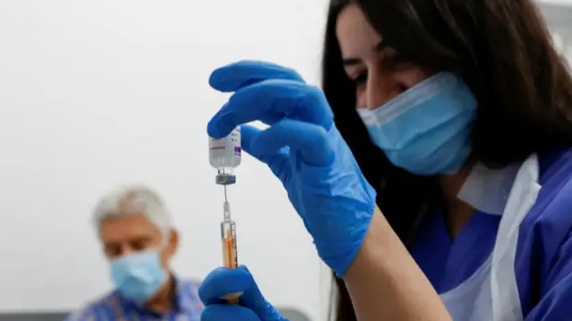 Nurse with vaccine