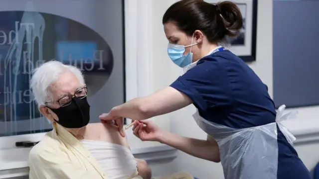 Nurse giving a vaccine