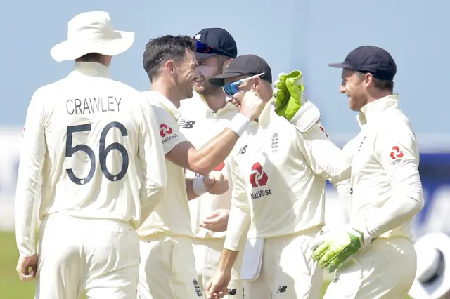 England celebrate a wicket