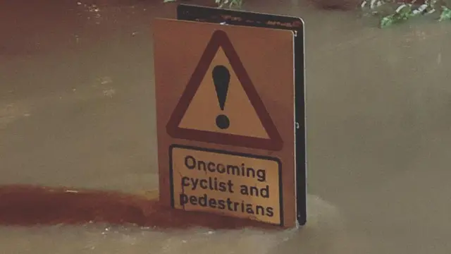 Sign in flood water