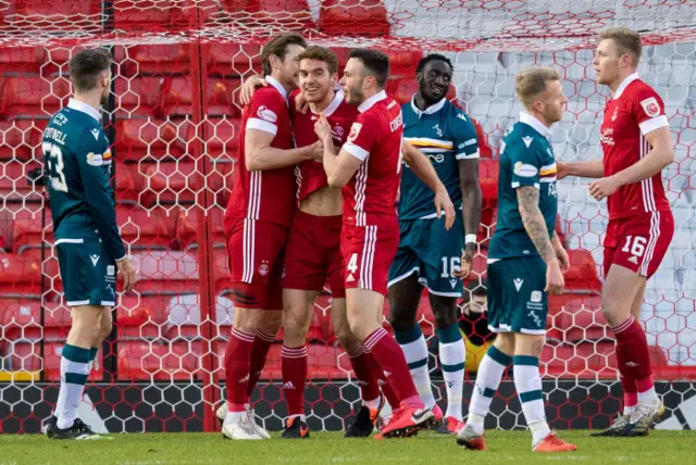 Tommie Hoban celebrates his opener at Pittodrie