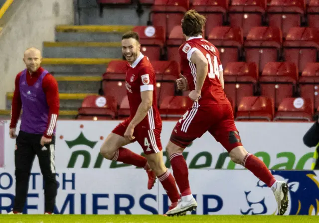 Andrew Considine celebrates making it 2-0