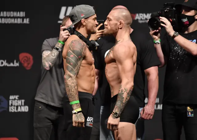 Conor McGregor and Dustin Poirier face off at the pre-fight weigh-in