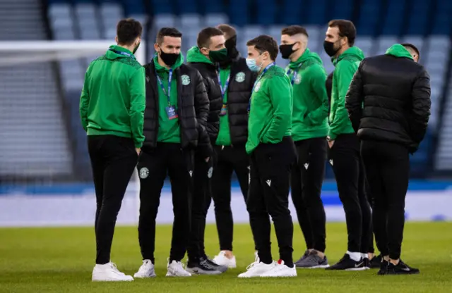 Hibs players enjoy a chat on the Hampden pitch ahead of kick off