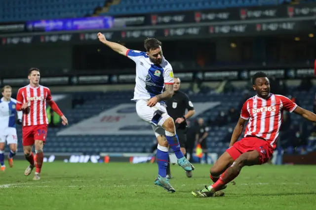 Adam Armstrong gets a shot away for Blackburn