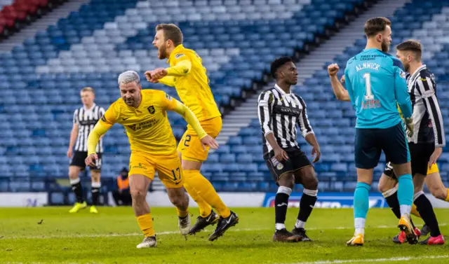 Scott Robinson celebrates scoring