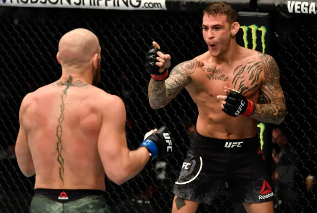 Dustin Poirier pointing at Conor McGregor