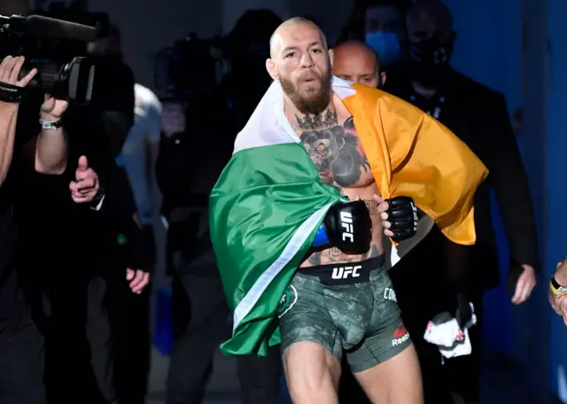 Conor McGregor walks to the octagon at UFC 257