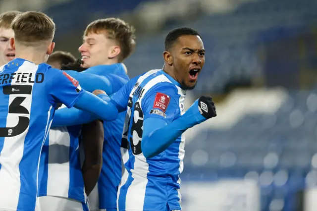 Jaden Brown celebrates with Huddersfield